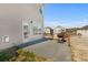 Private backyard with patio, grill, and view of neighboring houses at 2528 Shropshire Pl, Mcdonough, GA 30253