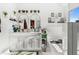Modern bathroom with double vanity and a separate tub at 2528 Shropshire Pl, Mcdonough, GA 30253