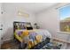 Cozy bedroom with plush bedding and ample natural light at 2528 Shropshire Pl, Mcdonough, GA 30253