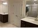 Double vanity bathroom with a separate shower and linen closet at 7594 Shady Maple Way, Lithonia, GA 30038