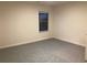 Spacious bedroom with neutral wall paint and carpet flooring at 7594 Shady Maple Way, Lithonia, GA 30038