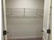Walk-in closet with wire shelving at 7594 Shady Maple Way, Lithonia, GA 30038