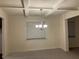 Elegant dining room with a coffered ceiling and a chandelier at 7594 Shady Maple Way, Lithonia, GA 30038
