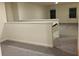 Spacious loft area with carpet and two windows offering natural light at 7594 Shady Maple Way, Lithonia, GA 30038