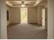Large main bedroom with ceiling fan and access to the en-suite bathroom at 7594 Shady Maple Way, Lithonia, GA 30038