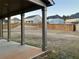 Covered patio offers backyard views and ample entertaining space at 7594 Shady Maple Way, Lithonia, GA 30038