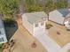 Two-story house with gray roof, two-car garage, and small yard at 1752 Alford Dr, Jonesboro, GA 30236
