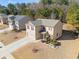 Two-story house with gray roof, two-car garage, and manicured lawn at 1752 Alford Dr, Jonesboro, GA 30236