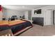 Spacious bedroom with large bed, dresser, and workspace at 1752 Alford Dr, Jonesboro, GA 30236