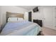 Comfortable bedroom with a striped comforter and plenty of closet space at 1752 Alford Dr, Jonesboro, GA 30236