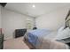 Cozy bedroom with a full-size bed and a dresser at 1752 Alford Dr, Jonesboro, GA 30236
