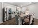 Bright kitchen featuring stainless steel appliances and granite countertops at 1752 Alford Dr, Jonesboro, GA 30236