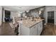 Modern kitchen with granite island and stainless steel appliances at 1752 Alford Dr, Jonesboro, GA 30236