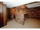 Finished basement bar with brick wall and wood details at 2963 Thompson Cir, Decatur, GA 30034