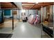 Unfinished basement with concrete floor and exposed beams at 2963 Thompson Cir, Decatur, GA 30034