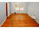 Simple bedroom with hardwood floors and window at 2963 Thompson Cir, Decatur, GA 30034