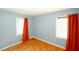 Bedroom with hardwood floors and blue walls at 2963 Thompson Cir, Decatur, GA 30034