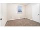 Bright bedroom with neutral walls, carpet, and a closet at 3355 Renault Se Rd, Atlanta, GA 30354