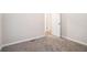 Simple bedroom with neutral walls and carpet flooring at 3355 Renault Se Rd, Atlanta, GA 30354