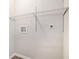 Laundry area with wire shelving and hookups for washer and dryer at 3355 Renault Se Rd, Atlanta, GA 30354