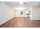 Spacious living room with hardwood floors and an open kitchen at 3355 Renault Se Rd, Atlanta, GA 30354
