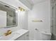 Clean bathroom with white vanity, gold fixtures, and marble shower at 3293 Abbeywood Dr, Decatur, GA 30034