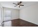 Simple bedroom with dark hardwood floors and a ceiling fan at 3293 Abbeywood Dr, Decatur, GA 30034