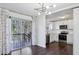 Bright dining room with hardwood floors and kitchen view at 3293 Abbeywood Dr, Decatur, GA 30034