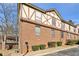 Brick building exterior, featuring a unique architectural design and landscaping at 3293 Abbeywood Dr, Decatur, GA 30034