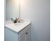 Clean bathroom featuring a white vanity with granite countertops and modern fixtures at 4783 Sultana Sw Way, Atlanta, GA 30331