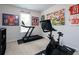 This exercise room features workout equipment and a window with natural light at 4783 Sultana Sw Way, Atlanta, GA 30331