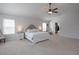 Bright main bedroom featuring a decorative headboard and ample natural light at 4783 Sultana Sw Way, Atlanta, GA 30331