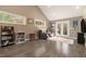 Cozy living room showcasing wood floors, neutral-colored walls, and a French door at 675 Mayes Rd, Powder Springs, GA 30127