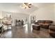 Spacious living room featuring hardwood floors, a vaulted ceiling, and ample natural light at 675 Mayes Rd, Powder Springs, GA 30127