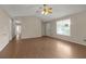Bright living room with laminate floors and neutral walls at 1308 Crumbley Rd, Mcdonough, GA 30252