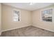 Spacious bedroom featuring neutral wall paint and carpet at 1903 Wildwood Dr, Decatur, GA 30032
