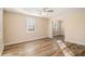 Bright living room with wood-look floors and ceiling fan at 1903 Wildwood Dr, Decatur, GA 30032