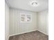 Bedroom with neutral walls and wood paneling at 2352 Scotty Cir, Decatur, GA 30032