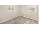 Simple bedroom with neutral walls and carpet at 2352 Scotty Cir, Decatur, GA 30032
