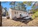 Rear view of a charming ranch house with a deck and spacious backyard at 2352 Scotty Cir, Decatur, GA 30032