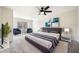 Main bedroom with ceiling fan, plush carpet, and ample space at 325 Antebellum Pl, Woodstock, GA 30188