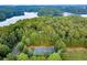Community basketball court nestled in a lush, wooded area at 505 Blue Mountain Rise, Canton, GA 30114