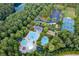Resort-style pool, tennis courts, playground, and clubhouse in a wooded setting at 505 Blue Mountain Rise, Canton, GA 30114