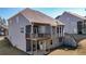 Two story house with gray siding and a deck at 505 Blue Mountain Rise, Canton, GA 30114