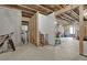 Unfinished basement with partial walls and open space at 505 Blue Mountain Rise, Canton, GA 30114