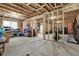 Partially finished basement with areas for storage and a gym at 505 Blue Mountain Rise, Canton, GA 30114