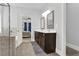 Bathroom with double vanity, shower, and garden tub at 505 Blue Mountain Rise, Canton, GA 30114