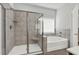 Bathroom with walk-in shower and built-in seat at 505 Blue Mountain Rise, Canton, GA 30114