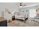 Bedroom with a metal bed frame and a workspace at 505 Blue Mountain Rise, Canton, GA 30114