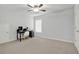 Bedroom with a desk, window, and ceiling fan at 505 Blue Mountain Rise, Canton, GA 30114